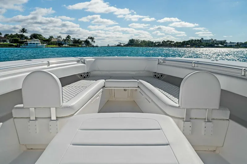 Ohana Yacht Photos Pics 2019 Invincible 42 Open Fisherman boat interior with white seating and ocean view.