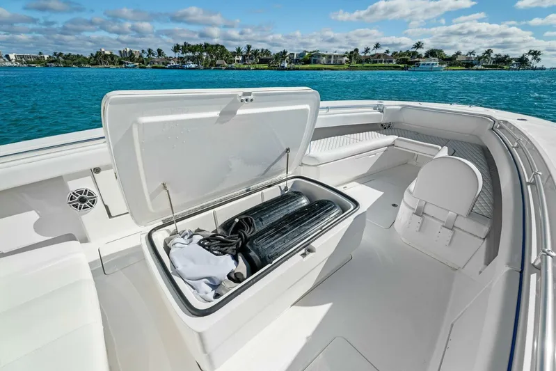 Ohana Yacht Photos Pics 2019 Invincible 42 Open Fisherman boat with open storage compartment on deck.