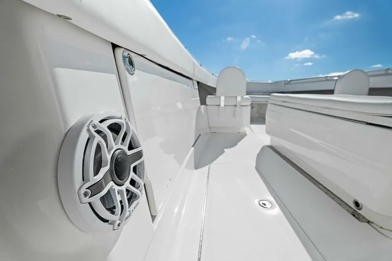 Ohana Yacht Photos Pics 2019 Invincible 42 Open Fisherman boat interior with speaker and seating.