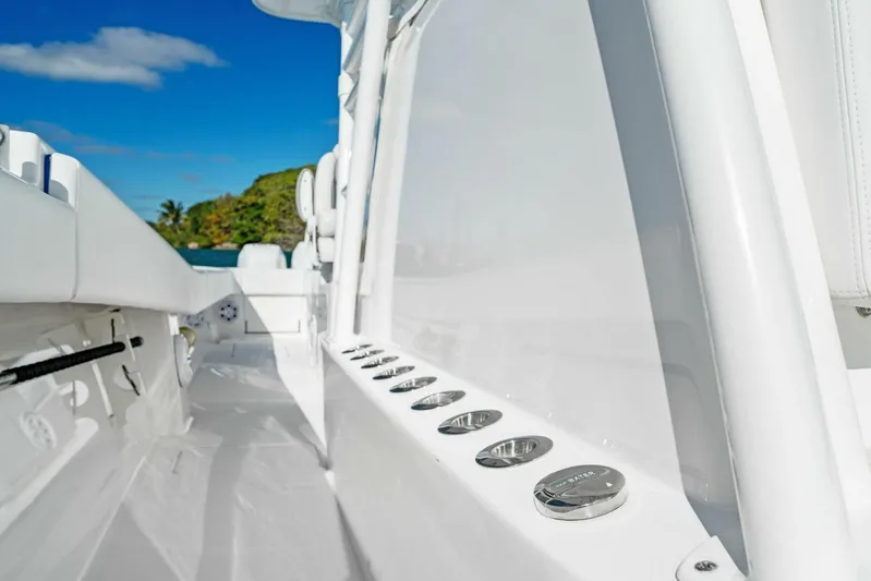Ohana Yacht Photos Pics 2019 Invincible 42 Open Fisherman boat deck with rod holders.