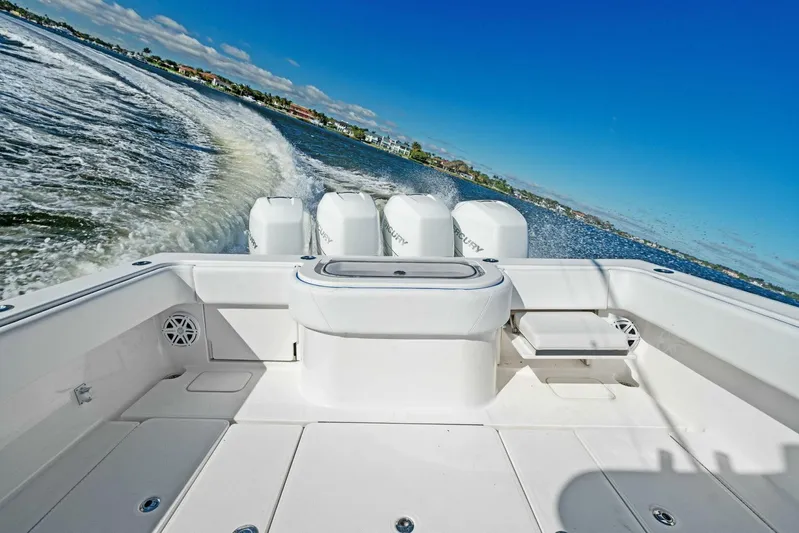 Ohana Yacht Photos Pics 2019 Invincible 42 Open Fisherman boat cruising on open water.