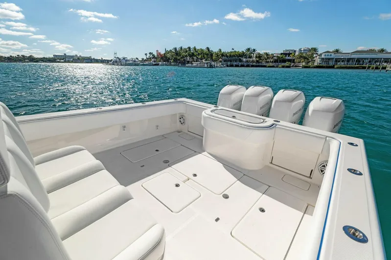 Ohana Yacht Photos Pics 2019 Invincible 42 Open Fisherman boat with spacious deck and quad outboard engines.