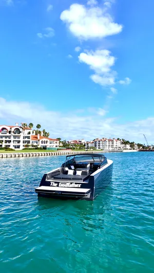 The Godfather Yacht Photos Pics 2014 VanDutch 55 yacht cruising in sunny coastal waters.