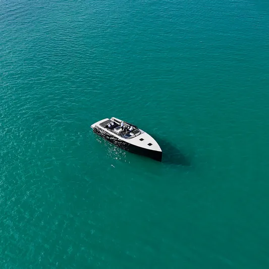The Godfather Yacht Photos Pics VanDutch 55 yacht from 2014 cruising on clear turquoise waters.