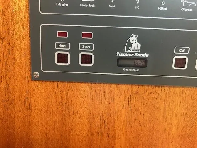 Day Light Yacht Photos Pics Control panel of a 1968 Hatteras 58 CPMY with Fischer Panda engine hours display.