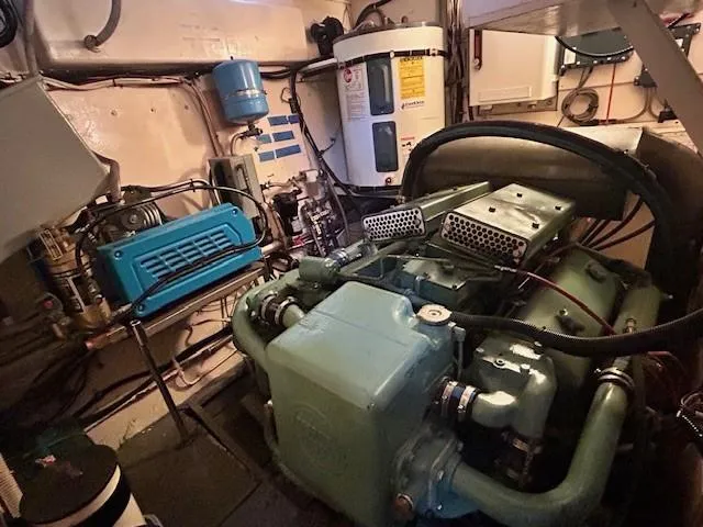 Day Light Yacht Photos Pics Engine room of 1968 Hatteras 58 CPMY yacht with visible machinery and equipment.