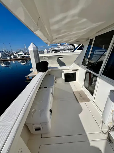 Mamba Mentality Yacht Photos Pics 2008 Meridian 490 Pilothouse yacht deck with marina view.