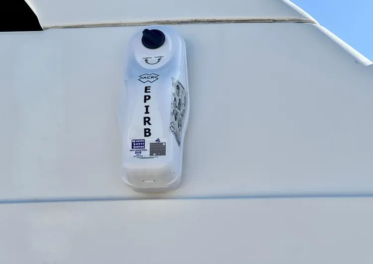 Mamba Mentality Yacht Photos Pics EPIRB mounted on 2008 Meridian 490 Pilothouse yacht exterior.