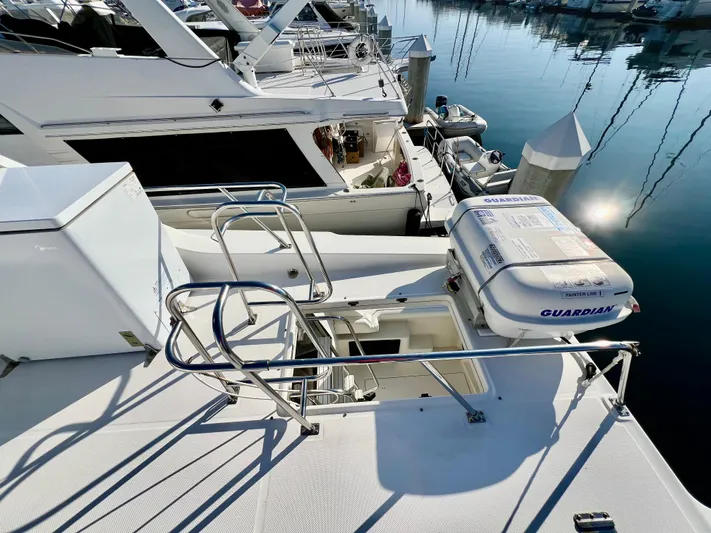 Mamba Mentality Yacht Photos Pics 2008 Meridian 490 Pilothouse yacht deck with safety equipment at marina.