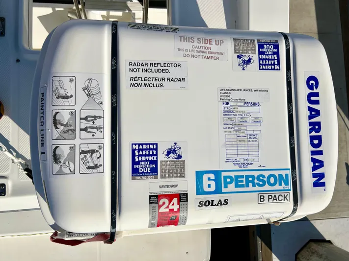 Mamba Mentality Yacht Photos Pics Meridian 490 Pilothouse 2008 liferaft, 6-person capacity, safety instructions visible.