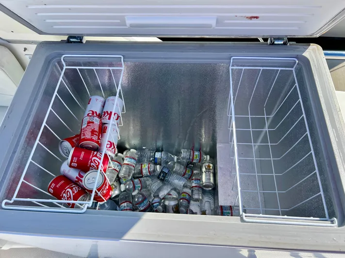 Mamba Mentality Yacht Photos Pics Cooler on 2008 Meridian 490 Pilothouse with Diet Coke cans and water bottles.