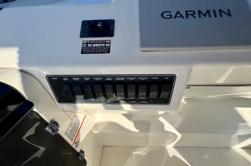 Mamba Mentality Yacht Photos Pics Control panel of 2008 Meridian 490 Pilothouse with Garmin navigation system.