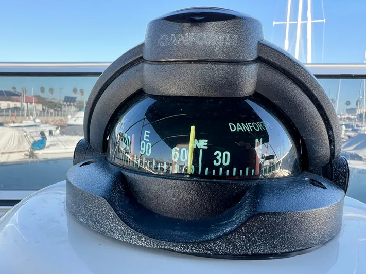 Mamba Mentality Yacht Photos Pics Compass on 2008 Meridian 490 Pilothouse yacht, showing northeast direction.