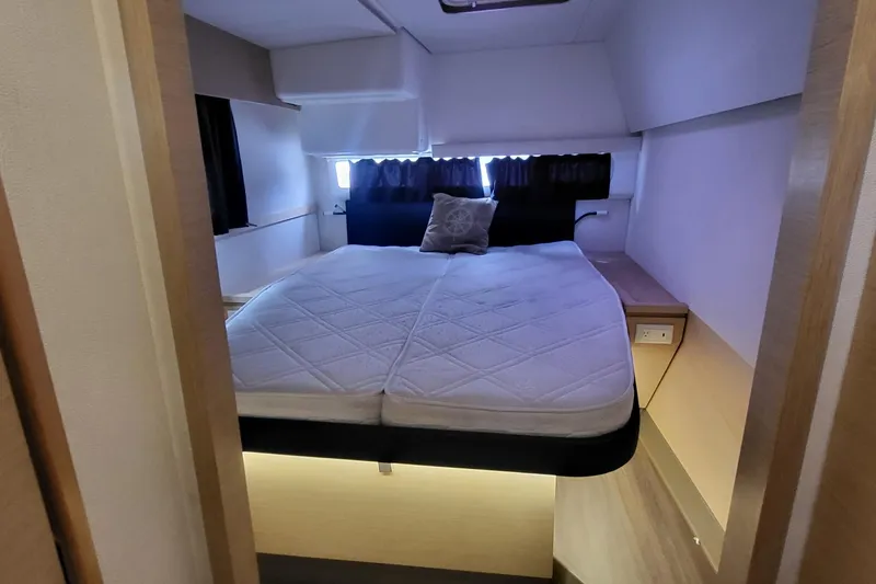 Knot On Call Yacht Photos Pics Interior cabin of 2018 Fountaine Pajot Helia 44 catamaran with cozy bed.