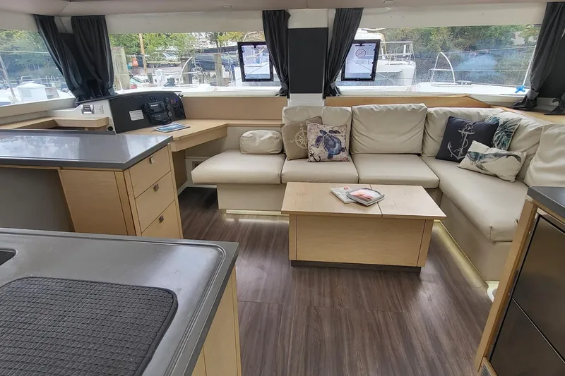 Knot On Call Yacht Photos Pics Interior of 2018 Fountaine Pajot Helia 44 catamaran with modern seating and decor.