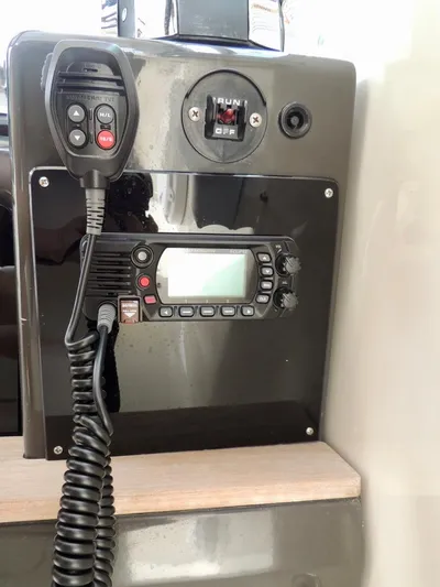  Yacht Photos Pics VHF radio and control panel on a 2016 Sea Ray 350 Sundancer boat.