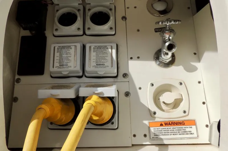  Yacht Photos Pics Electrical and water connections on a 2016 Sea Ray 350 Sundancer boat.