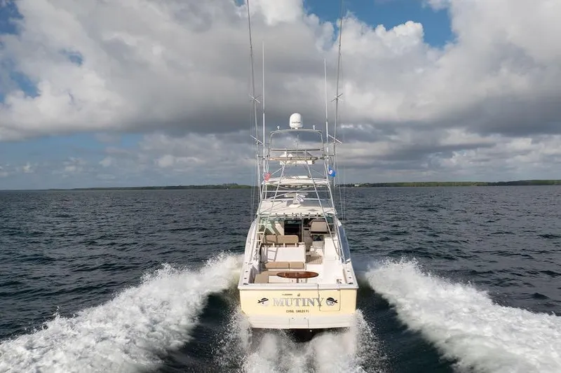  Yacht Photos Pics 2005 Tiara Yachts 4200 Open cruising on open water under cloudy skies.