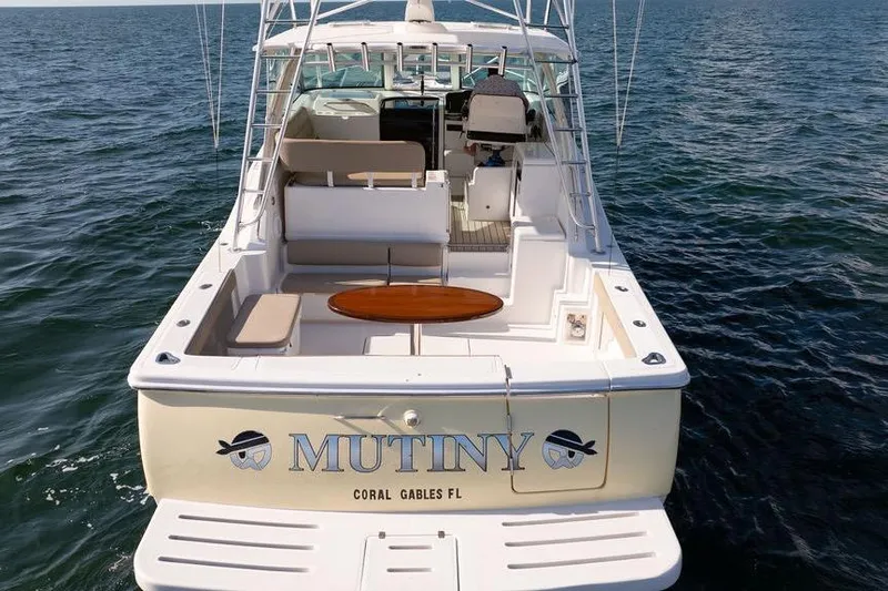 Yacht Photos Pics 2005 Tiara Yachts 4200 Open boat named "Mutiny" on the water, Coral Gables, FL.