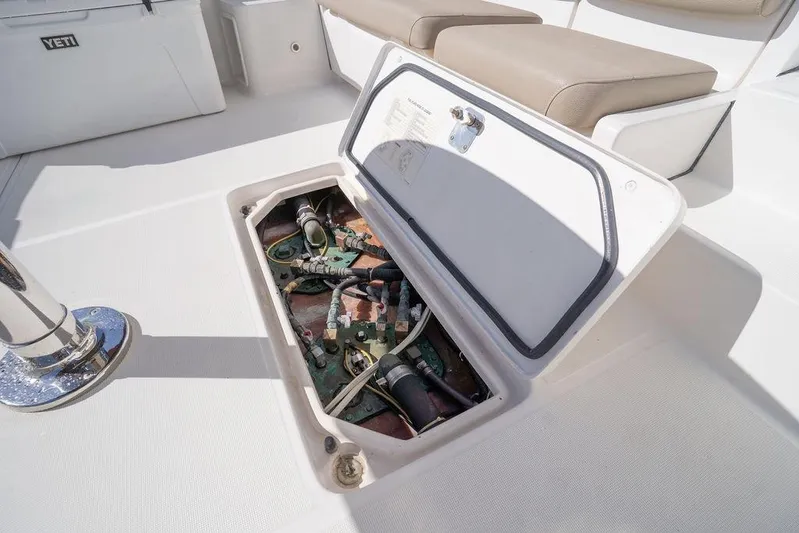  Yacht Photos Pics Open hatch on 2005 Tiara Yachts 4200 Open, revealing internal components.