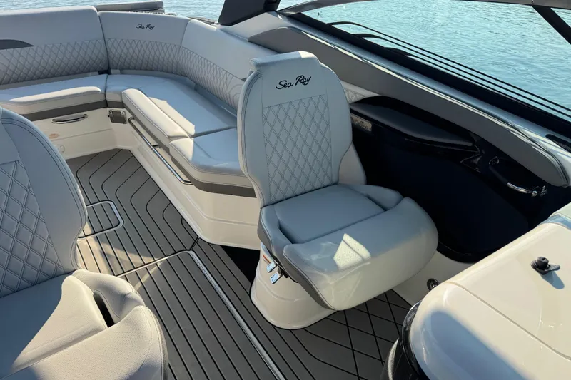  Yacht Photos Pics 2024 Sea Ray SLX 280 boat interior with luxurious seating and elegant design.