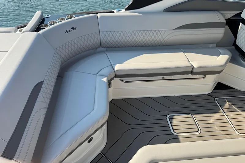  Yacht Photos Pics Luxurious seating on 2024 Sea Ray SLX 280 boat, featuring elegant design and premium materials.