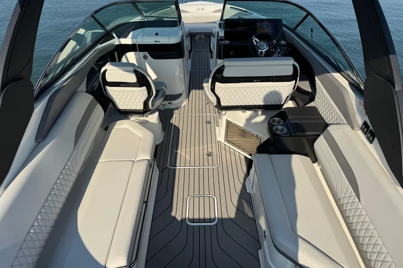  Yacht Photos Pics 2024 Sea Ray SLX 280 boat interior with luxurious seating and modern dashboard design.