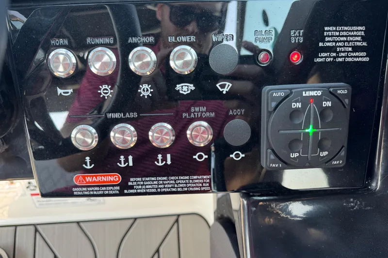  Yacht Photos Pics 2024 Sea Ray SLX 280 control panel with various switches and warning labels.