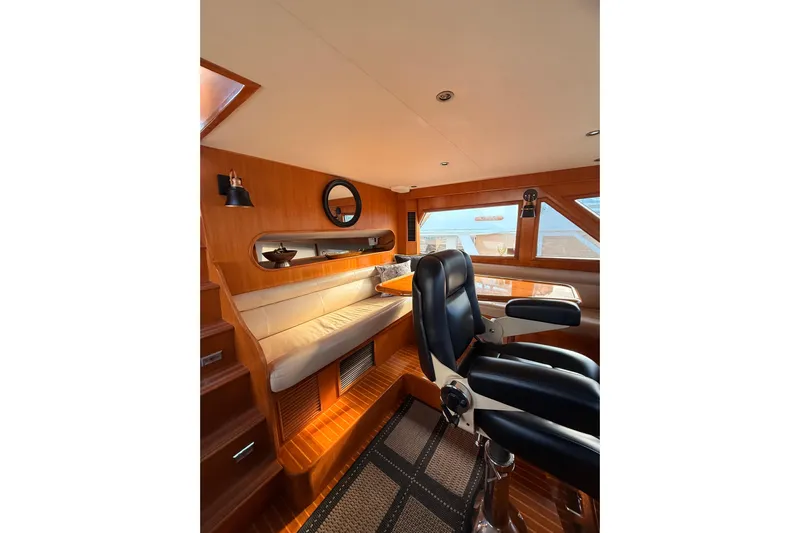 Island Girl Yacht Photos Pics Luxurious 1997 Ocean Alexander 486 Pilothouse interior with leather seating and wooden accents.
