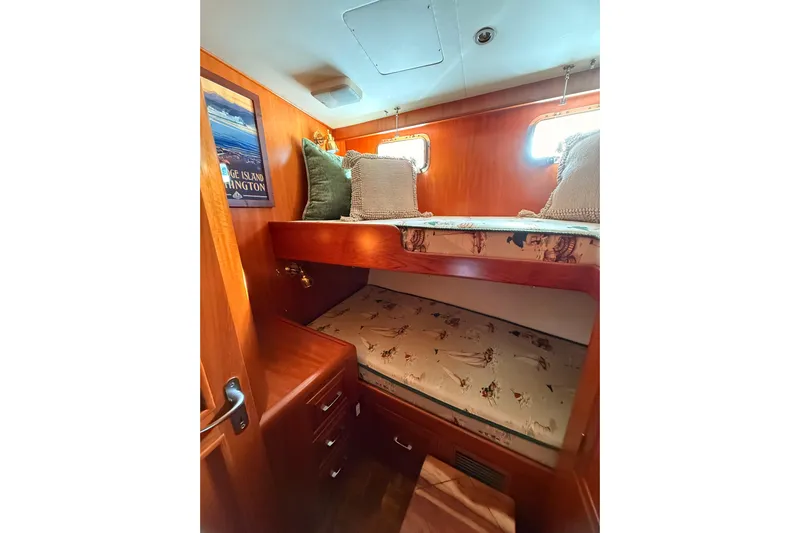 Island Girl Yacht Photos Pics Cozy cabin with bunk beds in 1997 Ocean Alexander 486 Pilothouse yacht.
