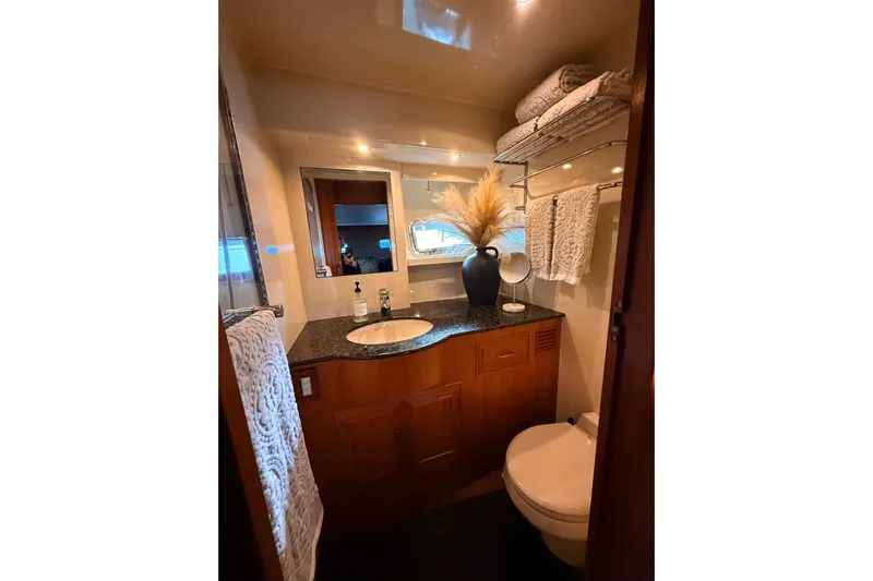 Island Girl Yacht Photos Pics Luxurious bathroom in 1997 Ocean Alexander 486 Pilothouse yacht with elegant decor.