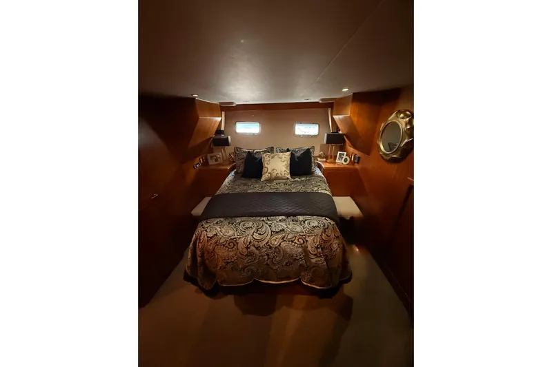 Island Girl Yacht Photos Pics Luxurious bedroom interior of 1997 Ocean Alexander 486 Pilothouse yacht.