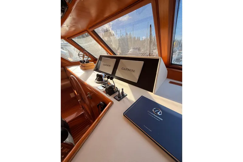 Island Girl Yacht Photos Pics Pilothouse interior of 1997 Ocean Alexander 486 with Garmin navigation displays.