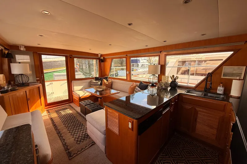 Island Girl Yacht Photos Pics Luxurious interior of 1997 Ocean Alexander 486 Pilothouse yacht with elegant furnishings.