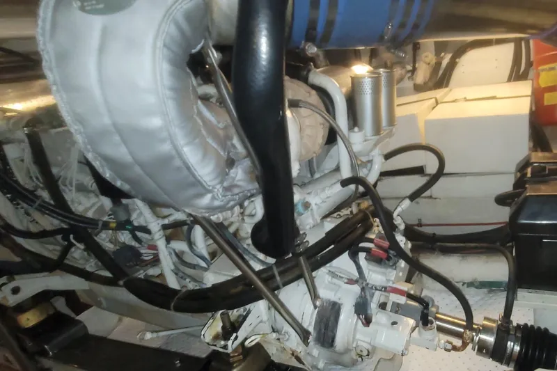 Island Girl Yacht Photos Pics Engine compartment of a 1997 Ocean Alexander 486 Pilothouse yacht, showcasing mechanical components.