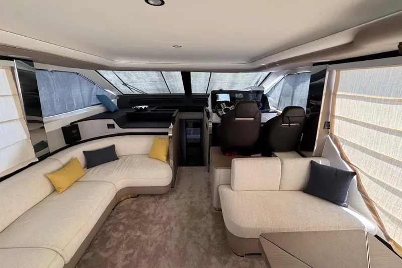  Yacht Photos Pics Luxurious interior of 2024 Azimut 60 yacht with elegant seating and modern helm station.