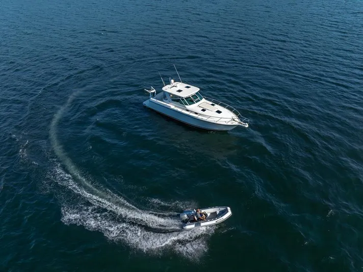  Yacht Photos Pics Aerial view of 2001 Tiara Sport 4000 EXPRESS yacht on open water.