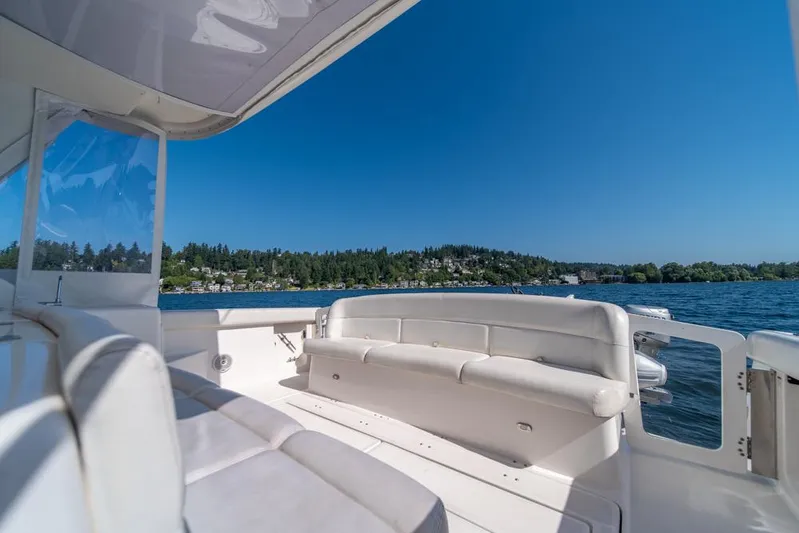  Yacht Photos Pics 2001 Tiara Sport 4000 EXPRESS yacht interior with lake view and clear blue sky.