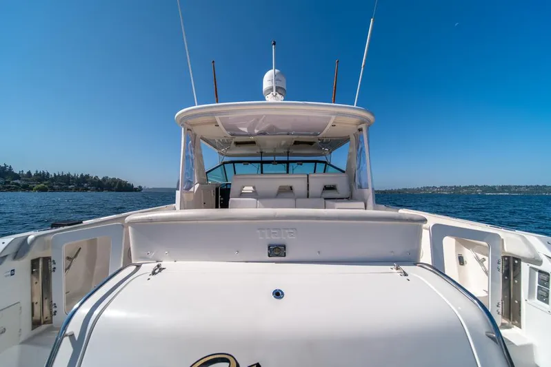  Yacht Photos Pics 2001 Tiara Sport 4000 EXPRESS yacht on open water under clear blue sky.