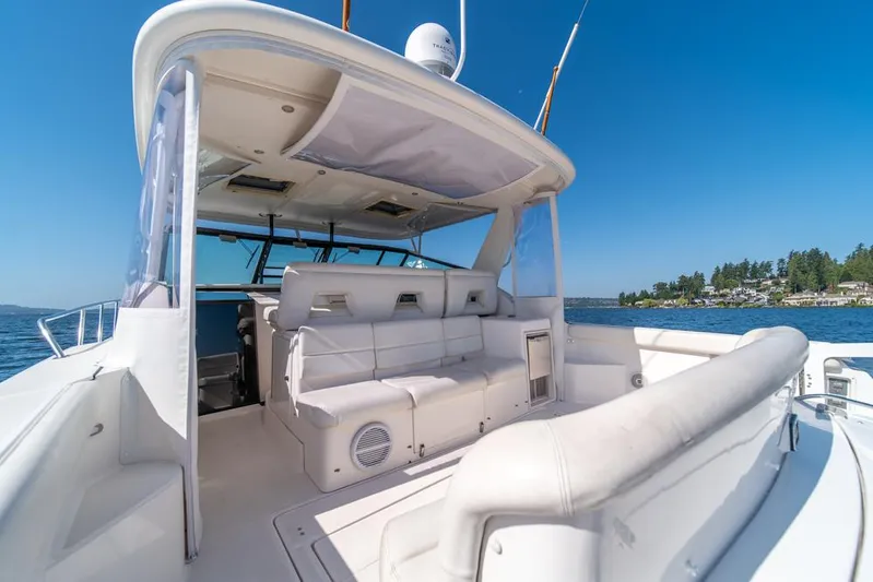  Yacht Photos Pics 2001 Tiara Sport 4000 EXPRESS yacht interior with white seating, on a sunny day at sea.