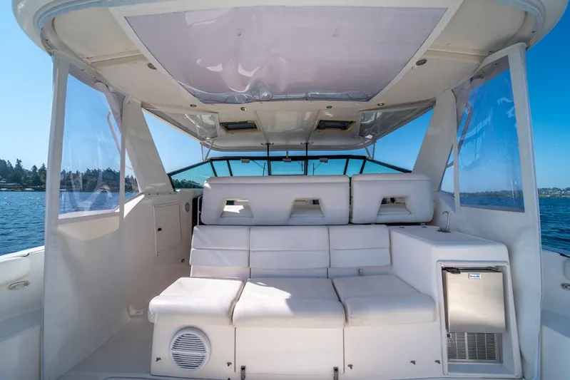  Yacht Photos Pics 2001 Tiara Sport 4000 EXPRESS yacht interior with white seating and open water view.