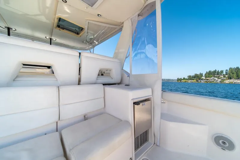  Yacht Photos Pics Interior of 2001 Tiara Sport 4000 EXPRESS yacht with white seating and scenic water view.