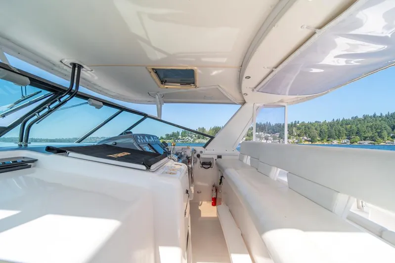  Yacht Photos Pics Interior view of 2001 Tiara Sport 4000 EXPRESS yacht with scenic water backdrop.