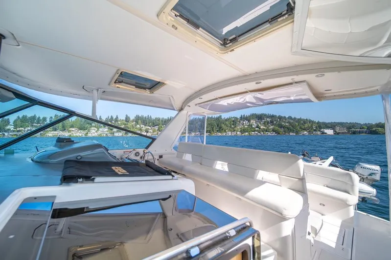  Yacht Photos Pics 2001 Tiara Sport 4000 EXPRESS yacht interior with scenic lake view.