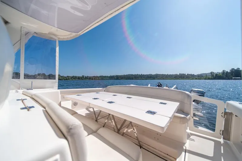  Yacht Photos Pics 2001 Tiara Sport 4000 EXPRESS yacht interior with lake view and seating area.