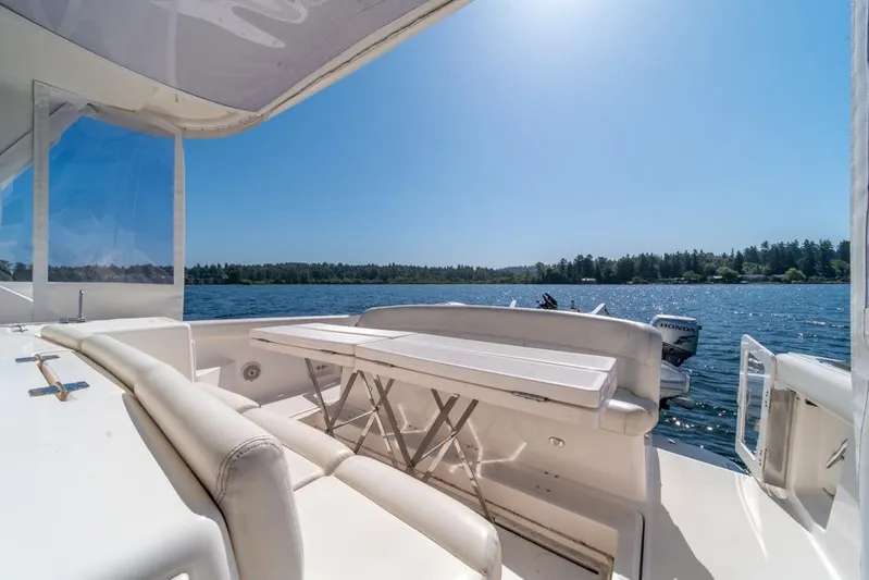  Yacht Photos Pics 2001 Tiara Sport 4000 EXPRESS yacht interior with lake view and seating area.