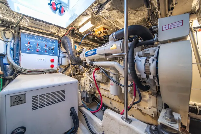  Yacht Photos Pics Engine room of a 2001 Tiara Sport 4000 EXPRESS, showcasing machinery and control panels.