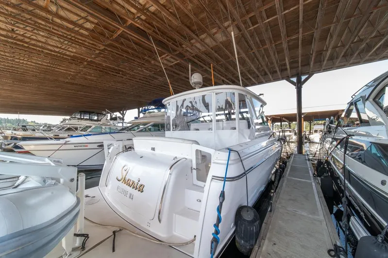  Yacht Photos Pics 2001 Tiara Sport 4000 EXPRESS yacht docked in a covered marina.