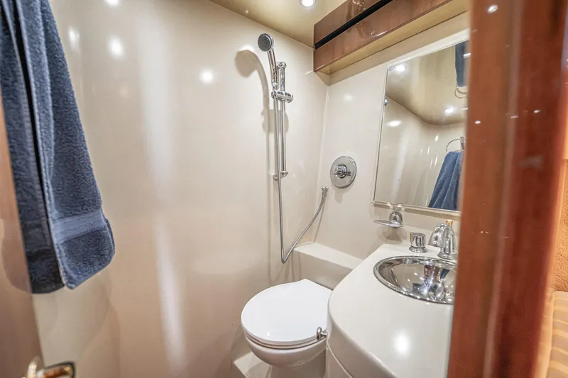 Manana Yacht Photos Pics Luxurious bathroom in 2007 Egg Harbor 43 SportYacht with shower and sink.
