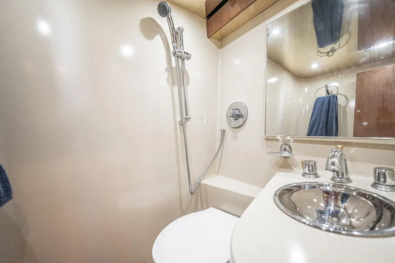 Manana Yacht Photos Pics Luxurious bathroom in 2007 Egg Harbor 43 SportYacht with modern fixtures and shower.